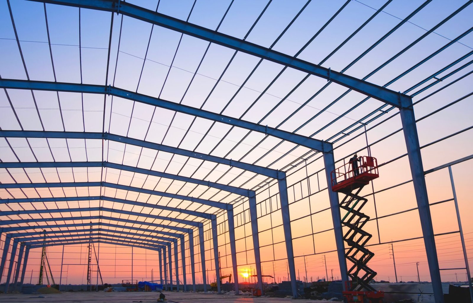 Factory,Building,Steel,Structure,Background,With,Silhouette,Welder,Worker,On